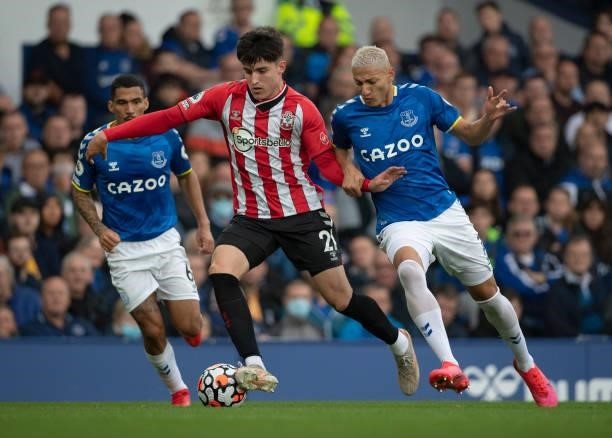 Valentino Livramento of Southampton and Richarlison of Everton in action during the Premier League match between Everton and Southampton at Goodison...