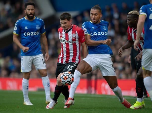 Romain Perraud of Southampton in action with Andros Townsend and Dominic Calvert-Lewin of Everton during the Premier League match between Everton and...