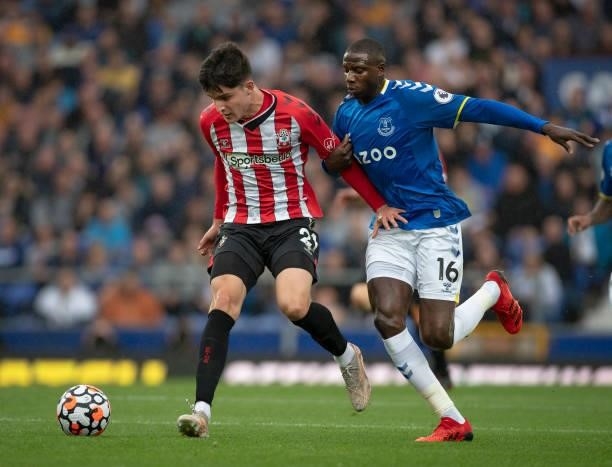 Valentino Livramento of Southampton and Abdoulaye Doucouré of Everton in action during the Premier League match between Everton and Southampton at...
