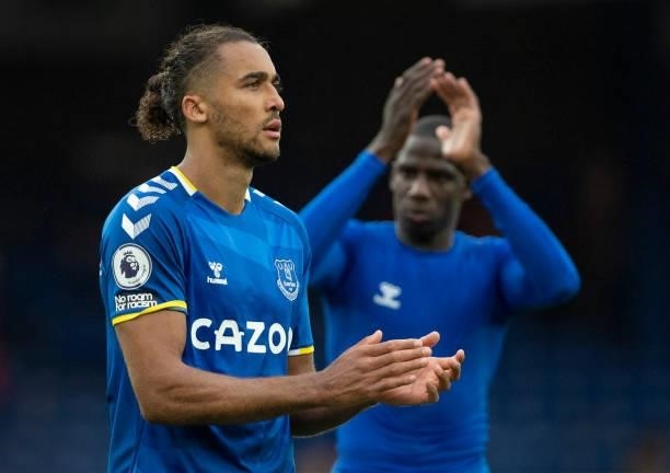 Dominic Calvert-Lewin and Abdoulaye Doucouré of Everton applaud the fans after the Premier League match between Everton and Southampton at Goodison...