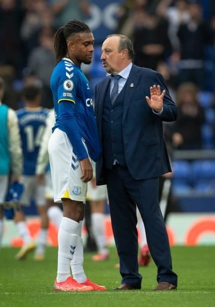 Everton manager Rafa Benitez talks with Alex Iwobi after the Premier League match between Everton and Southampton at Goodison Park on August 14, 2021...