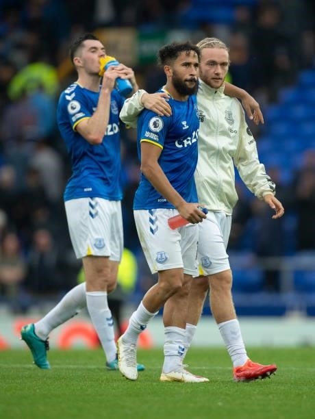 Michael Keane, Andros Townsend and Tom Davies of Everton walk off after the Premier League match between Everton and Southampton at Goodison Park on...