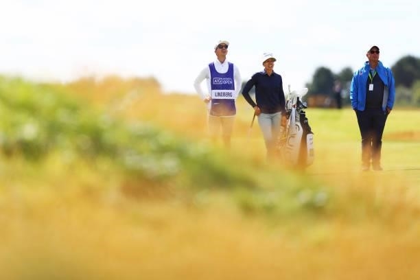 Pernilla Lindberg of Sweden looks on with her caddie during a practice round prior to the AIG Women's Open at Carnoustie Golf Links on August 17,...