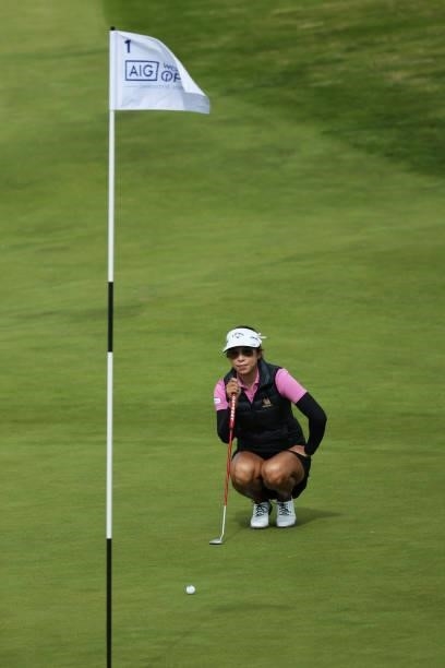 Prima Thammaraks of Thailand lines up a putt during a practice round prior to the AIG Women's Open at Carnoustie Golf Links on August 17, 2021 in...