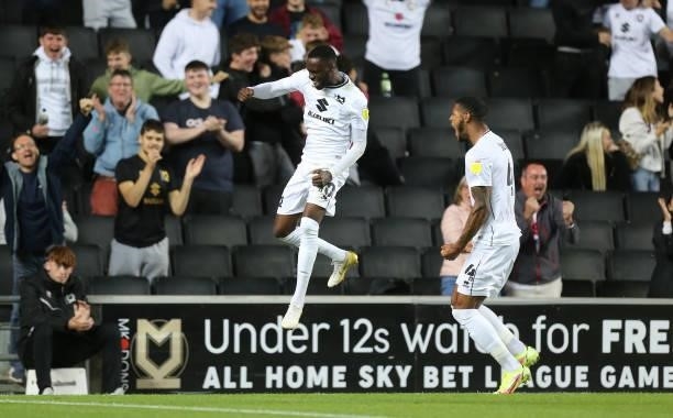 Mo Eisa of Milton Keynes Dons celebrates after scoring his sides second goal during the Sky Bet League One match between Milton Keynes Dons and...