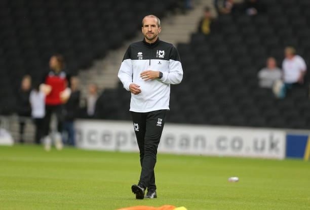 Milton Keynes Dons assistant first team coach David Wright looks on during pre match warm up prior to the Sky Bet League One match between Milton...
