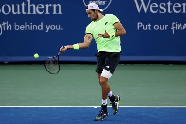 Matteo Berrettini of Italy plays a forehand during his match against Albert Ramos-Vinolas of Spain during day three of the Western & Southern Open at...