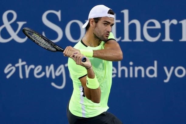 Matteo Berrettini of Italy plays a backhand during his match against Albert Ramos-Vinolas of Spain during day three of the Western & Southern Open at...