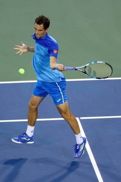Albert Ramos-Vinolas of Spain plays a forehand during his match against Matteo Berrettini of Italy during day three of the Western & Southern Open at...