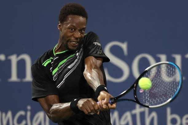 Gael Monfils of France returns a shot to Dusan Lajovic of Serbia during the Western & Southern Open at Lindner Family Tennis Center on August 17,...