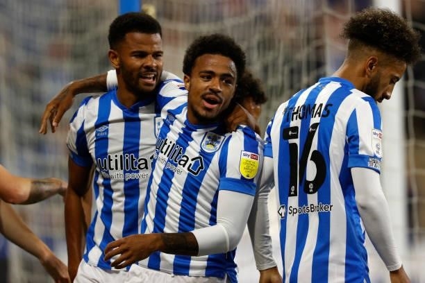 Josh Koroma celebrates with Fraizer Campbell of Huddersfield Town during the Sky Bet Championship match between Huddersfield Town and Preston North...
