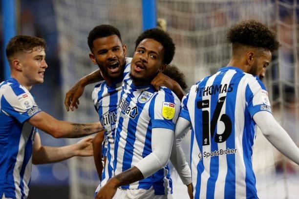 Huddersfield Town players including Scott High, Fraizer Campbell and Josh Koroma celebrate the winning goal during the Sky Bet Championship match...