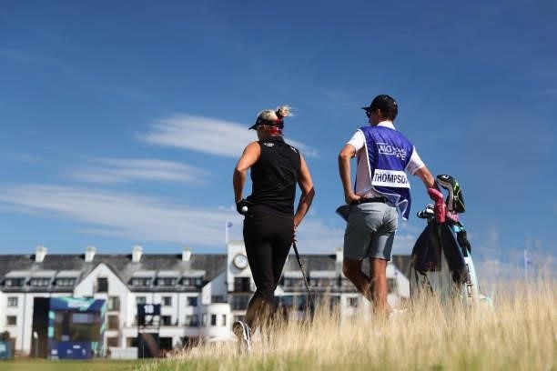 Lexi Thompson of The United States and her caddie wait on the eighteenth hole during the Pro-Am prior to the AIG Women's Open at Carnoustie Golf...