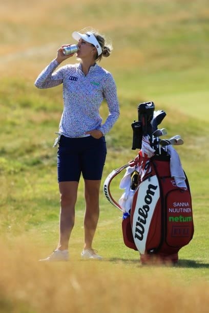 Sanna Nuutinen of Finland takes a drink during the Pro-Am prior to the AIG Women's Open at Carnoustie Golf Links on August 18, 2021 in Carnoustie,...