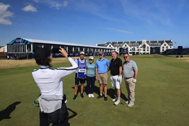 Nasa Hataoka of Japan and her Pro-AM group pose for a photo on the eighteenth hole during the Pro-Am prior to the AIG Women's Open at Carnoustie Golf...