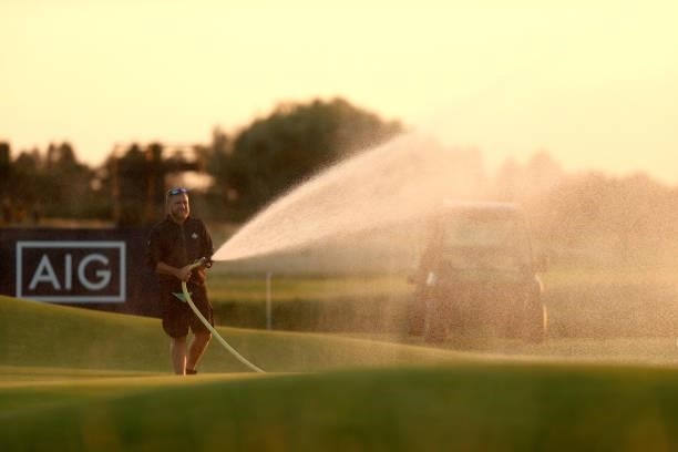 Greenkeeper prepares the course following a practice round prior to the AIG Women's Open at Carnoustie Golf Links on August 17, 2021 in Carnoustie,...