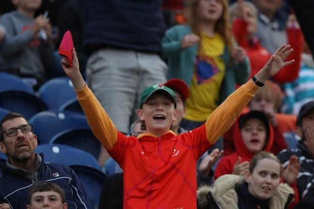 Fan of Welsh Fire cheers during The Hundred match between Welsh Fire Men and London Spirit Men at Sophia Gardens on August 18, 2021 in Cardiff, Wales.