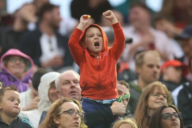 Young fan of Welsh Fire reacts during The Hundred match between Welsh Fire Men and London Spirit Men at Sophia Gardens on August 18, 2021 in Cardiff,...