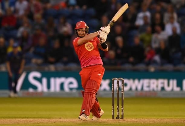 Glenn Phillips of Welsh Fire hits a six during The Hundred match between Welsh Fire Men and London Spirit Men at Sophia Gardens on August 18, 2021 in...