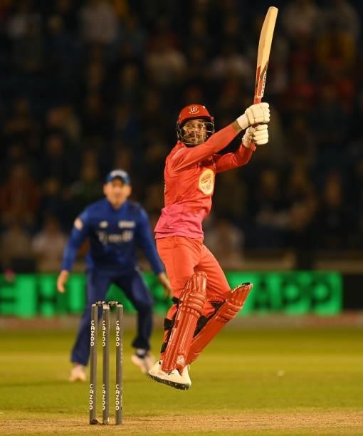 Qais Ahmad of Welsh Fire hits the winning runs in The Hundred match between Welsh Fire Men and London Spirit Men at Sophia Gardens on August 18, 2021...