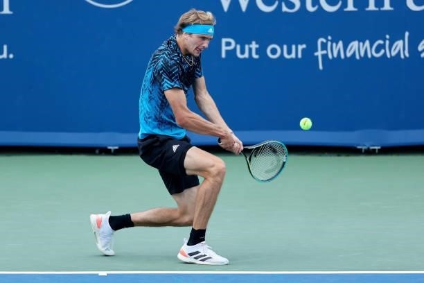 Alexander Zverev of Germany plays a backhand during his match against Lloyd Harris of South Africa during Western & Southern Open - Day 4 at Lindner...