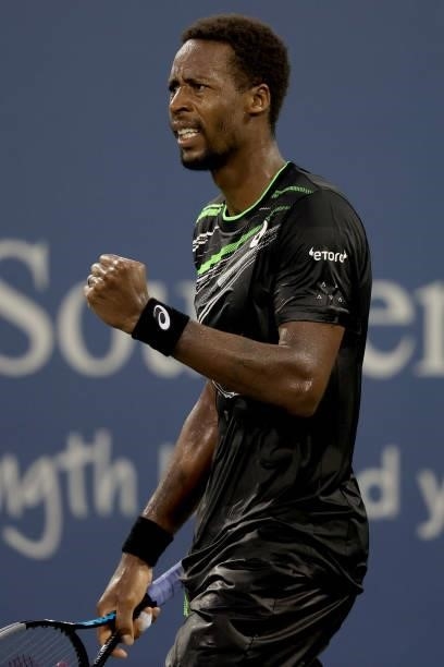 Gael Monfils of France celebrates breaking Alex De Minaur of Australia in the thrid set during the Western & Southern Open at Lindner Family Tennis...