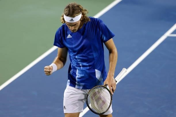 Stefanos Tsitsipas of Greece reacts after winning a point during his match against Sebastian Korda during Western & Southern Open - Day 4 at Lindner...