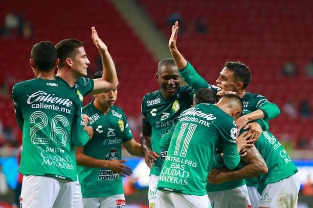 Santiago Colombatto of Leon celebrates with teammates after scoring his team's third goal during the 5th round match between Chivas and Leon as part...