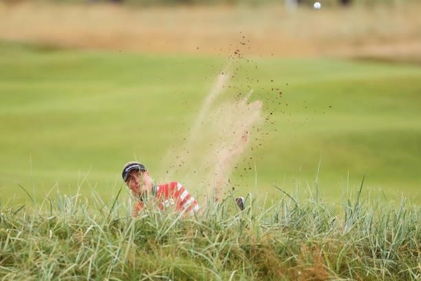 Charley Hull of England plays a bunker shot during Day One of the AIG Women's Open at Carnoustie Golf Links on August 19, 2021 in Carnoustie,...