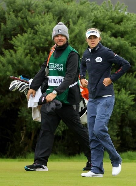 Nelly Korda of The United States and her caddie during the first round of the AIG Women's Open at Carnoustie Golf Links on August 19, 2021 in...