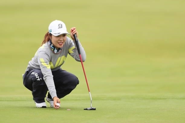 Ayaka Furue of Japan lines up a putt on the seventh hole during Day One of the AIG Women's Open at Carnoustie Golf Links on August 19, 2021 in...