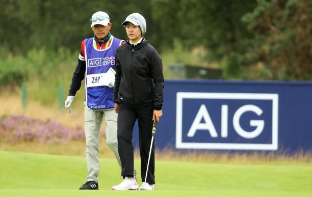 Rose Zhang of The United States and her caddie on the 8th green during the first round of the AIG Women's Open at Carnoustie Golf Links on August 19,...
