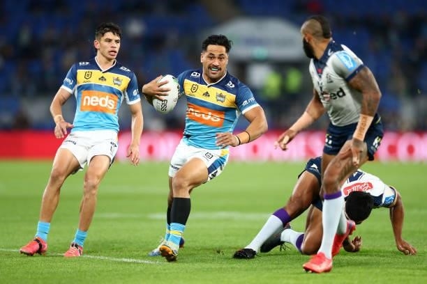 Patrick Herbert of the Titans makes a break during the round 23 NRL match between the Gold Coast Titans and the Melbourne Storm at Cbus Super...