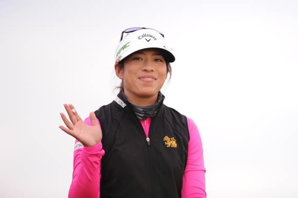 Prima Thammaraks of Thailand waves after teeing off on the seventeenth hole during a practice round prior to the AIG Women's Open at Carnoustie Golf...