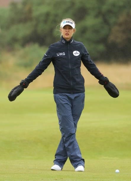 Nelly Korda of The United States keeping warm on the 12th fairway during the first round of the AIG Women's Open at Carnoustie Golf Links on August...