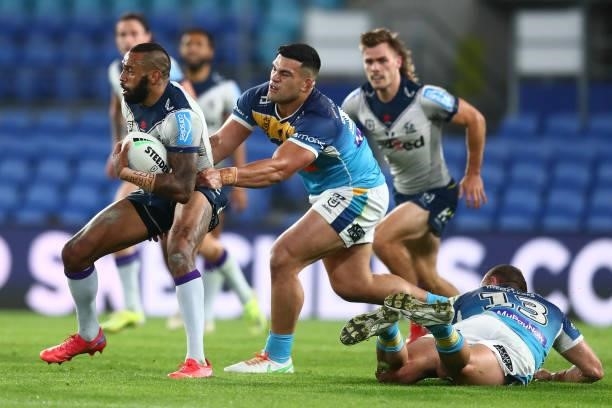 Josh Addo-Carr of the Storm runs with the ball during the round 23 NRL match between the Gold Coast Titans and the Melbourne Storm at Cbus Super...