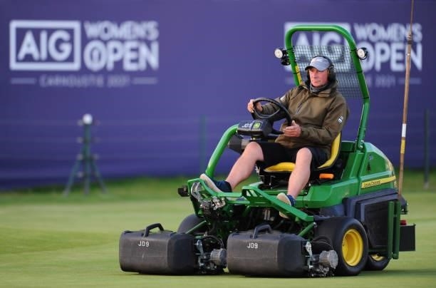 Greenkeeper prepares the course following a practice round prior to the AIG Women's Open at Carnoustie Golf Links on August 17, 2021 in Carnoustie,...