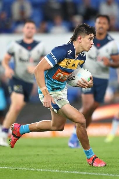 Jayden Campbell of the Titans runs with the ball during the round 23 NRL match between the Gold Coast Titans and the Melbourne Storm at Cbus Super...