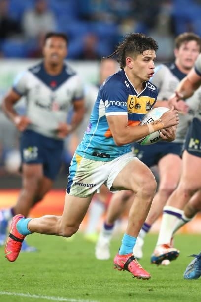 Jayden Campbell of the Titans runs with the ball during the round 23 NRL match between the Gold Coast Titans and the Melbourne Storm at Cbus Super...