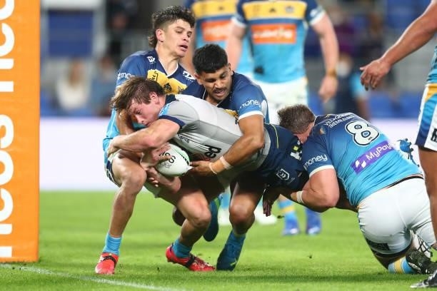 Harry Grant of the Storm scores a try during the round 23 NRL match between the Gold Coast Titans and the Melbourne Storm at Cbus Super Stadium, on...