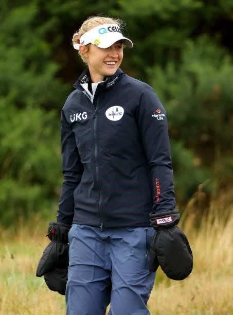 Nelly Korda of The United States keeping warm on the 14th hole during the first round of the AIG Women's Open at Carnoustie Golf Links on August 19,...