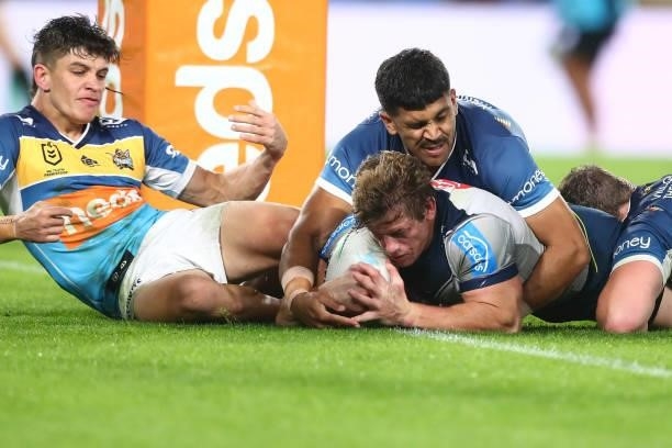 Harry Grant of the Storm scores a try during the round 23 NRL match between the Gold Coast Titans and the Melbourne Storm at Cbus Super Stadium, on...