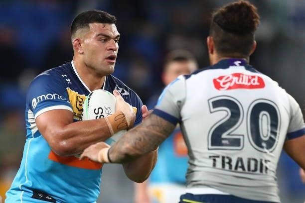 David Fifita of the Titans is tackled during the round 23 NRL match between the Gold Coast Titans and the Melbourne Storm at Cbus Super Stadium, on...