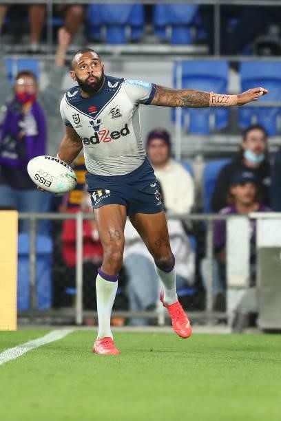 Josh Addo-Carr of the Storm celebrates scoring a try during the round 23 NRL match between the Gold Coast Titans and the Melbourne Storm at Cbus...