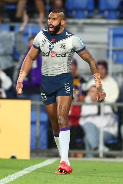 Josh Addo-Carr of the Storm celebrates scoring a try during the round 23 NRL match between the Gold Coast Titans and the Melbourne Storm at Cbus...