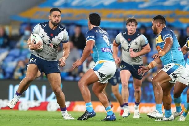 Kenneath Bromwich of the Storm runs with the ball during the round 23 NRL match between the Gold Coast Titans and the Melbourne Storm at Cbus Super...