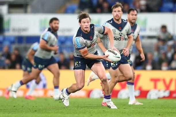 Harry Grant of the Storm passes the ball during the round 23 NRL match between the Gold Coast Titans and the Melbourne Storm at Cbus Super Stadium,...