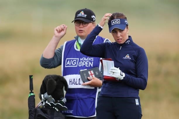 Georgia Hall of England and her caddie look on across the fourth hole during Day One of the AIG Women's Open at Carnoustie Golf Links on August 19,...