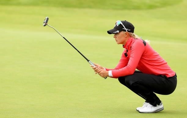 Madelene Sagstrom of Sweden lines up her putt on the 18th green during the first round of the AIG Women's Open at Carnoustie Golf Links on August 19,...
