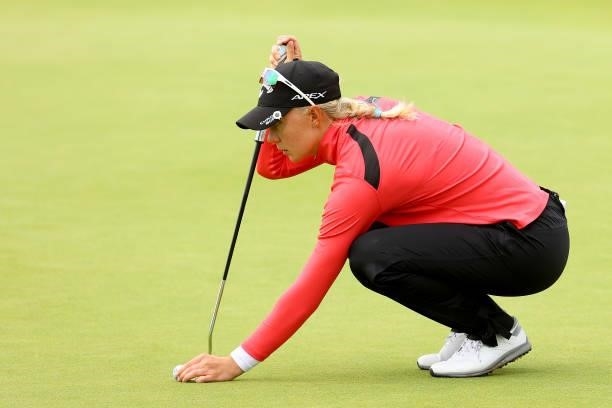 Madelene Sagstrom of Sweden lines up her putt on the 18th green during the first round of the AIG Women's Open at Carnoustie Golf Links on August 19,...